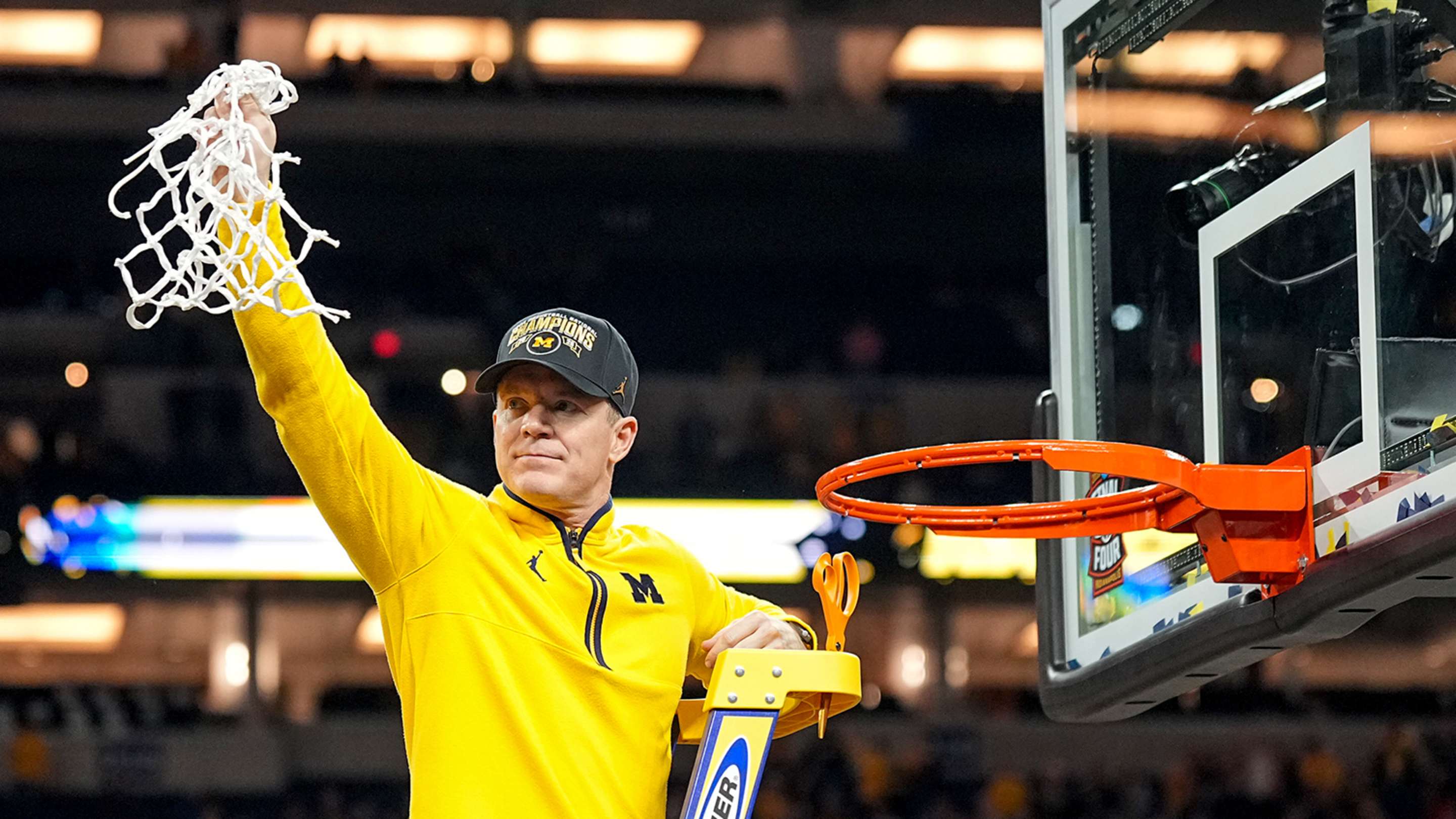 Dusty May and the Wolverines cut down the nets as national champions