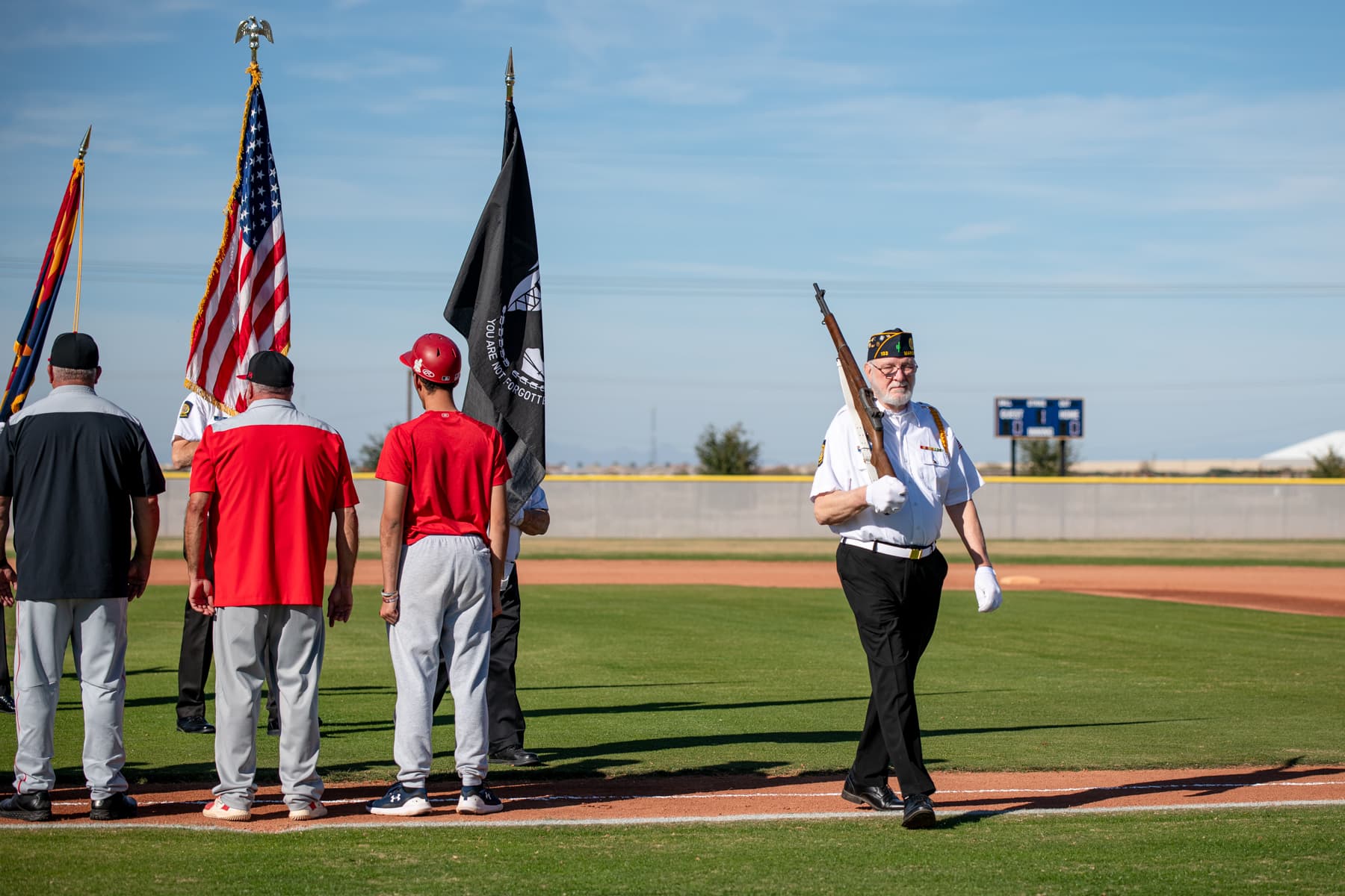 Desert Sunrise baseball opens season with tribute to veterans